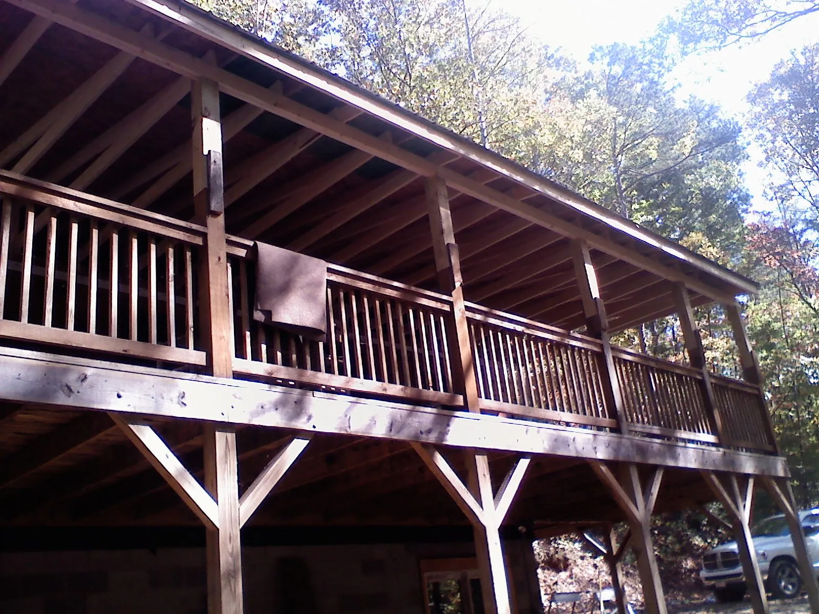 Timber framing under a new elevated porch and deck — Roof Leak Repair in Glendale Heights by Roofing Brothers